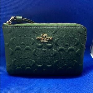 COACH SIGNATURE LEATHER CORNER ZIP WRISTLET